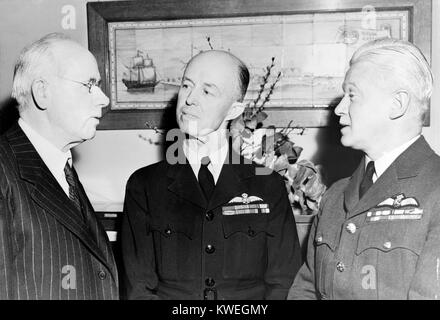 Prime Minister Peter Fraser of New Zealand, Air Marshal Richard Williams of the Royal Australian Air Force, and Air Commodore J. L. Findlay of the Royal New Zealand Air Force, in a church in New York City, attending ANZAC Day on 25th April 1944. Prime Minister Fraser, in New York on his way to a conference of Prime Min sisters of the British Commonwealth in London, England, addressed Australian and New Zealand airmen who attended the devices on their national holiday. Stock Photo