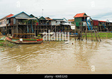 Wood and metal settlement, group of houses buildings on stilts, Kampong Phluk floating village, Tonle Sap Lake, Siem Reap, Cambodia, South East Asia Stock Photo