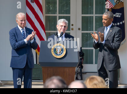 United States President Barack Obama, right, applauds Judge Merrick Garland, chief justice for the US Court of Appeals for the District of Columbia Circuit, center, after announcing him as his nominee to replace the late Associate Justice Antonin Scalia on the U.S. Supreme Court in the Rose Garden of the White House in Washington, D.C. on Wednesday, March 16, 2016.  US Vice President Joe Biden applauds at left. Credit: Ron Sachs / CNP /MediaPunch Stock Photo