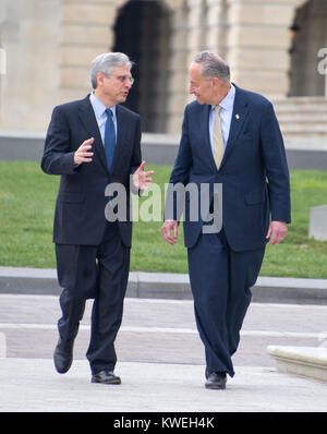 United States Senator Chuck Schumer (Democrat of New York), right, leads Judge Merrick Garland, chief justice for the US Court of Appeals for the District of Columbia Circuit, who is US President Barack Obama's selection to replace the late Associate Justice Antonin Scalia on the US Supreme Court, left, to a photo op at the US Capitol in Washington, DC on Tuesday, March 22, 2016.    Credit: Ron Sachs / CNP (RESTRICTION: NO New York or New Jersey Newspapers or newspapers within a 75 mile radius of New York City) /MediaPunch Stock Photo