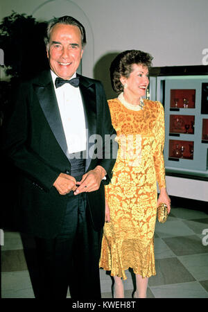 United States Senate Minority Leader Bob Dole (Republican of Kansas) and his wife, US Secretary of Labor Elizabeth Hanniford Dole, arrive for the State Dinner in honor of President Mikhail Gorbachev of the Union of Soviet Socialist Republics, at the White House in Washington, DC on Thursday, May 31, 1990.  Credit: Ron Sachs / CNP /MediaPunch Stock Photo