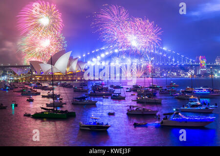 Australia celebrates the arrival of 2018 with New Years Eve fireworks on Sydney Harbour. The popular annual event attracts a crowd of over one million. Stock Photo