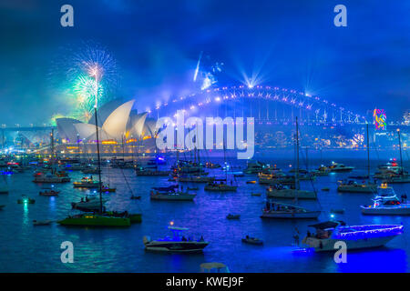 Australia celebrates the arrival of 2018 with New Years Eve fireworks on Sydney Harbour. The popular annual event attracts a crowd of over one million. Stock Photo