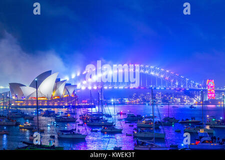 Australia celebrates the arrival of 2018 with New Years Eve fireworks on Sydney Harbour. The popular annual event attracts a crowd of over one million. Stock Photo