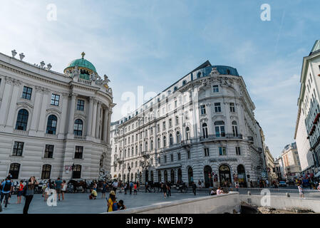 Vienna,  Austria - August 16, 2017: Michaelerplatz in Vienna with crowd of tourists Stock Photo