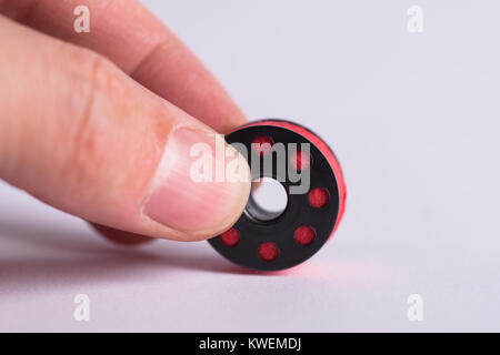 metal fingers on man's fingers Stock Photo