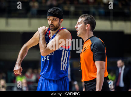 Forward Krunoslav Simon of Anadolu Efes Istanbul talks with the referee after his decision Stock Photo