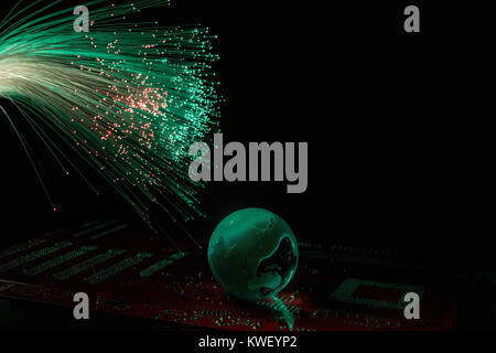 color fiber optical background on black, Fiber optics lights with globe, abstract background Stock Photo