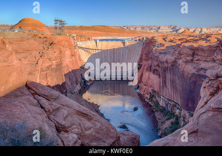 The Glen Canyon Dam on the Colorado River in Page, Arizona was built by the United States Bureau of Reclamation in 1966.  The dam forms Lake Powell Stock Photo