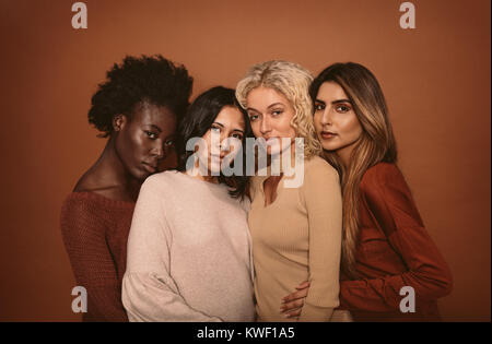 Beauty Diversity And Body Positivity With A Woman Friends Together In  Studio On A Brown Background For Inclusion Portrait Model And Underwear  With A Female Friend Group Standing Proud In Unity Stock