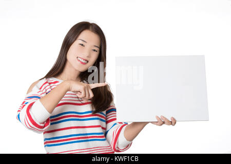 Beautiful Asian woman displaying a bit of attitude while holding a blank card isolated on a white background Stock Photo