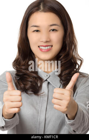 Portrait of a Beautiful Asian American woman displaying a bit of attitude isolated on a white background Stock Photo