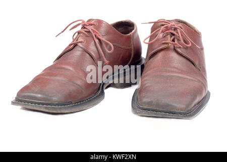 Pair used brown mans shoes isolated on white Stock Photo