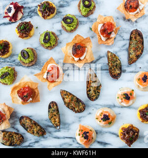 canapes in 8 rows on grey vein marble aerial Stock Photo