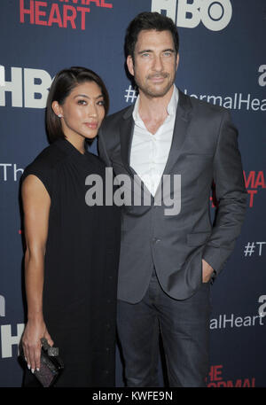 NEW YORK, NY - MAY 12: Shasi Wells Dylan McDermott attends 'The Normal Heart' New York Screening at Ziegfeld Theater on May 12, 2014 in New York City.  People:  Shasi Wells Dylan McDermott Stock Photo