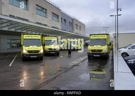 Ambulances Queuing Outside the Emergency Department - Broomfield Hospital, Court Road, Broomfield, Chelmsford, Essex, UK Stock Photo