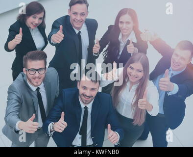 Top view of executives smiling and pointing Stock Photo - Alamy