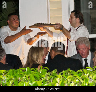 MIAMI BEACH  FL - JANUARY 21: Actress Cameron Diaz and Alex Rodriguez enjoy a romantic dinner in Miami with Former President Bill Clinton at Prime 112 Steakhouse.   On January 21, 2011 in Miami Beach, Florida   People:  Cameron Diaz Alex Rodriguez Bill Clinton Stock Photo