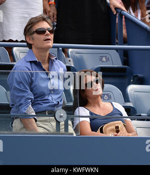 FLUSHING, NY - SEPTEMBER 01: Dr Mehmet Oz Lisa Oz on Day Seven of the 2013 US Open at USTA Billie Jean King National Tennis Center September 1, 2013 in the Flushing neighborhood of the Queens borough of New York City.    People:  Dr Mehmet Oz Lisa Oz Stock Photo