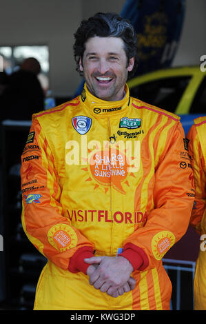 DAYTONA  BEACH FL - JANUARY 06:  Grey's Anatomy actor Patrick 'McDreamy' Dempsey is starting to show his age a bit as he is seen with a grey streak in his head. Patrick Galen Dempsey (born January 13, 1966) is an American actor, known for his role as neurosurgeon Dr. Derek Shepherd ('McDreamy') on the medical drama Grey's Anatomy. Dempsey is sighted during testing for Rolex Sports Car Series Rolex 24 at Daytona International Speedway on January 6, 2012 in Daytona Beach, Florida  People:  Patrick Dempsey Stock Photo