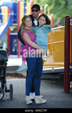 MIAMI, FL - NOVEMBER 6:  NY Yankees 3rd Baseman Alex Rodriquez, with ex wife Cynthia Scurtis (m. 2-Nov-2002, filed for div. 2008, two daughters) and daughters Ella Alexander (b. 21-Apr-2008) and Natasha Alexander (b. 18-Nov-2004) are sighted spending the day together at a Miami park.  This is the first time that Arod has been see with his ex wife Cynthia in over three years.  Alexander Emmanuel 'Alex' Rodriguez (born July 27, 1975) is an American professional baseball third baseman with the New York Yankees of Major League Baseball. Known popularly by his nickname A-Rod, he previously played s Stock Photo