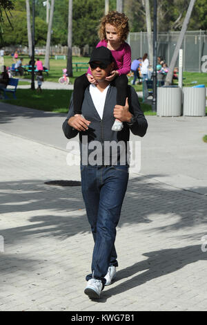 MIAMI, FL - NOVEMBER 6:  NY Yankees 3rd Baseman Alex Rodriquez, with ex wife Cynthia Scurtis (m. 2-Nov-2002, filed for div. 2008, two daughters) and daughters Ella Alexander (b. 21-Apr-2008) and Natasha Alexander (b. 18-Nov-2004) are sighted spending the day together at a Miami park.  This is the first time that Arod has been see with his ex wife Cynthia in over three years.  Alexander Emmanuel 'Alex' Rodriguez (born July 27, 1975) is an American professional baseball third baseman with the New York Yankees of Major League Baseball. Known popularly by his nickname A-Rod, he previously played s Stock Photo