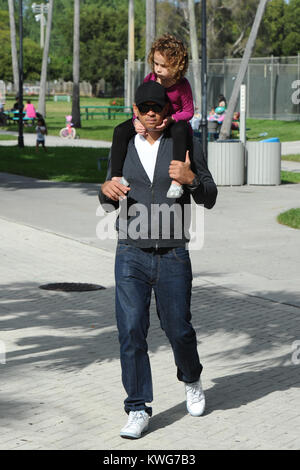 MIAMI, FL - NOVEMBER 6:  NY Yankees 3rd Baseman Alex Rodriquez, with ex wife Cynthia Scurtis (m. 2-Nov-2002, filed for div. 2008, two daughters) and daughters Ella Alexander (b. 21-Apr-2008) and Natasha Alexander (b. 18-Nov-2004) are sighted spending the day together at a Miami park.  This is the first time that Arod has been see with his ex wife Cynthia in over three years.  Alexander Emmanuel 'Alex' Rodriguez (born July 27, 1975) is an American professional baseball third baseman with the New York Yankees of Major League Baseball. Known popularly by his nickname A-Rod, he previously played s Stock Photo