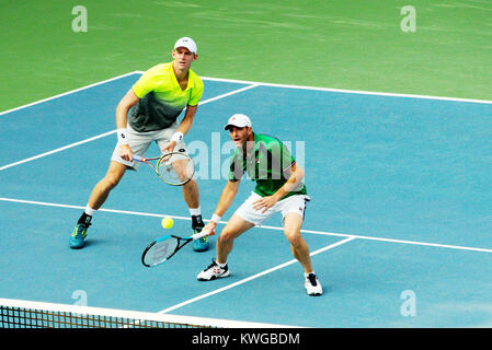 Pune, India. 2nd Jan, 2018. Kevin Anderson of South Africa and Jonathan Erlich of Israel in action in the first round of Doubles competition at Tata Open Maharashtra at the Mahalunge Balewadi Tennis Stadium in Pune, India. Credit: Karunesh Johri/Alamy Live News Stock Photo