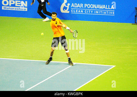 Pune, India. 2nd Jan, 2018. Yuki Bhambri of India in action in the first round of Singles competition at Tata Open Maharashtra at the Mahalunge Balewadi Tennis Stadium in Pune, India. Credit: Karunesh Johri/Alamy Live News Stock Photo