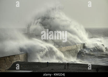 Newhaven, UK. 3rd Jan, 2018. Huge waves in Newhaven, East Sussex, draw spectators as Storm Eleanor brings strong winds to the south coast. Credit: Peter Cripps/Alamy Live News Stock Photo