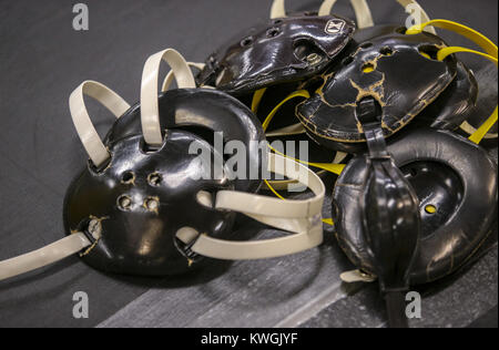 Iowa City, Iowa, USA. 8th Nov, 2017. Wrestling headgear is seen piled up before practice at the Dan Gable Wrestling Complex in Iowa City on Wednesday, November 8, 2017. Credit: Andy Abeyta/Quad-City Times/ZUMA Wire/Alamy Live News Stock Photo