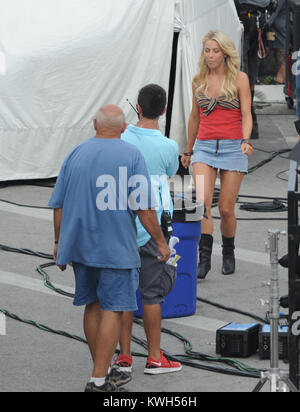 HOLLYWOOD, FL - MAY 23:   Julianne Hough and Diego Boneta on set the first day of filming  Rock of Ages' starring Tom Cruise..  Julianne was seen walking her two dogs in-between takes.   On May 23, 2011 in Miami Beach, Florida.   People:  Julianne Hough Diego Boneta Stock Photo