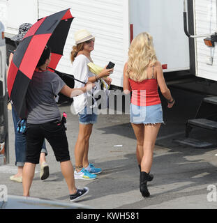 HOLLYWOOD, FL - MAY 23:   Julianne Hough and Diego Boneta on set the first day of filming  Rock of Ages' starring Tom Cruise..  Julianne was seen walking her two dogs in-between takes.   On May 23, 2011 in Miami Beach, Florida.   People:  Julianne Hough Diego Boneta Stock Photo