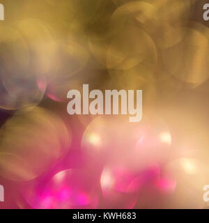 Colorful festive soft focus background. Gold, pink blurry bokeh. Stock Photo