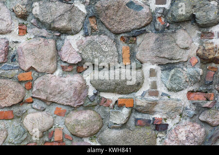 stones are arranged in a chaotic order and are a texture Stock Photo