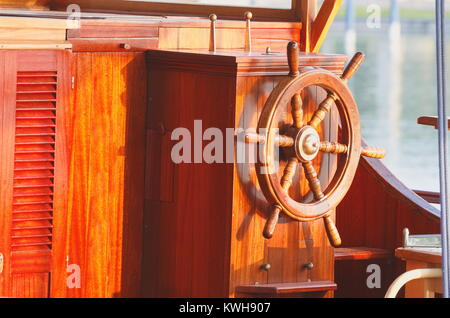 Classic Old Brown Wooden Ship Steering Wheel Stock Photo