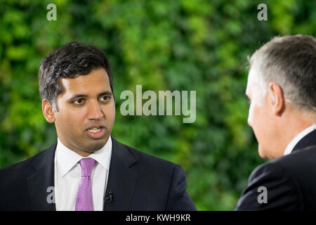 Faisal Islam, Sky TV News political editor, talking to Dermot Murnaghan on College Green, Westminster 2016 Stock Photo