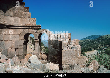 View through Double Stone Clerestory Windows of Ruined Byzantine Church at Binbirkilise or Binbir Kilise, literally The Thousand an One Churches, a region of antique Lycaonia, around the village of Madensehri, in Karaman Province, Turkey, known for around Fifty Ruined Byzantine Churches. The region was an important centre for Byzantine Christians between the c3rd and c8th. Stock Photo