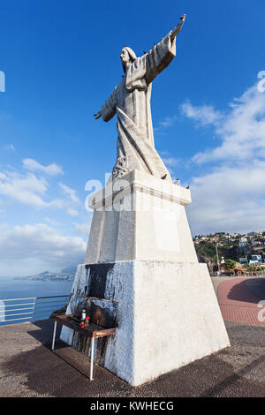 The Christ the King statue is a Catholic monument on Madeira island, Portugal Stock Photo