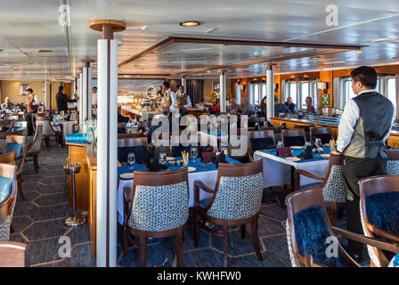 Dining room; passenger ship Ocean Adventurer carries alpine mountaineering skiers to Antarctica Stock Photo