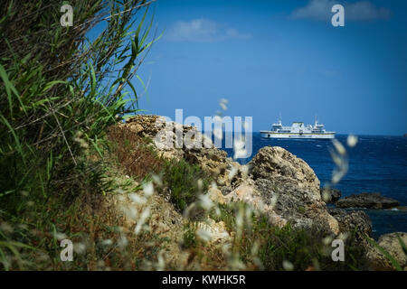 The Gozo Channel Company ferry crossing the Mediterranean channel between Cirkewwa Malta, and Mgarr Gozo. Stock Photo