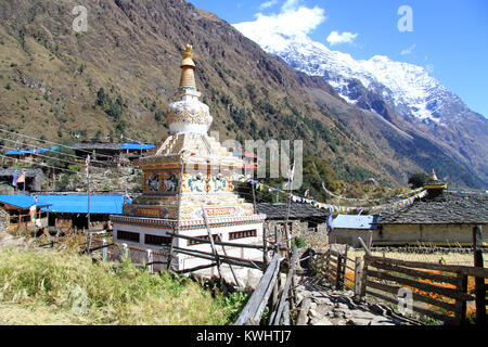 Buddhist stupa in the village in Nepal Stock Photo