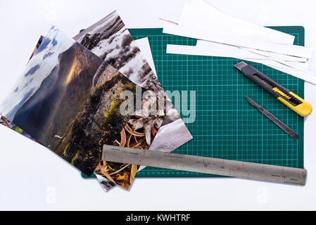 green cutting mat with ruler,craft knife and scalpel. Stock Photo