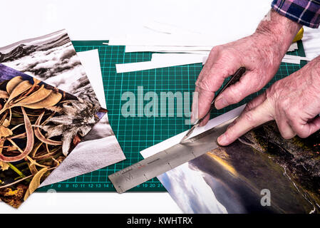 Sharp cutting blade on a green grid hobby mat, measured in inch and cm  Stock Photo - Alamy