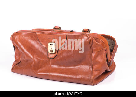 Vintage leather travel  bag over a white background Stock Photo