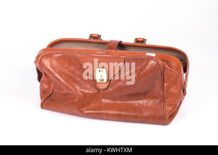Vintage leather travel  bag over a white background Stock Photo