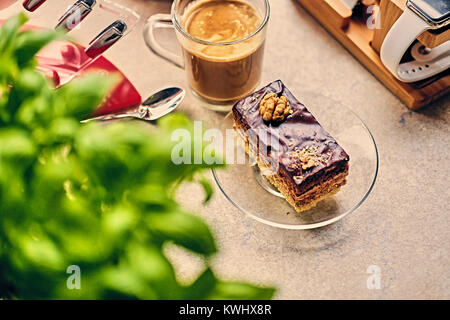 Sweet, delicious cake, herbs and cup of coffee Stock Photo