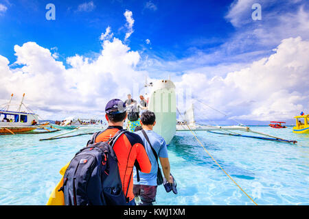 BORACAY ISLAND, PHILIPPINES - November 18, 2017 : Tourists on board to go hopping tour Stock Photo