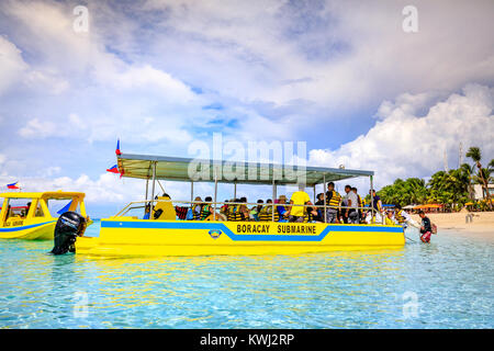 BORACAY ISLAND, PHILIPPINES - November 18, 2017 : People on the boat going to a submarine tour in Boracay beach Stock Photo