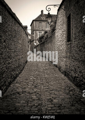 Old cobbled street, Carentan, Normandy, France Stock Photo